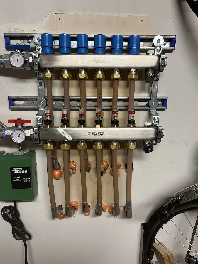 Plumber performing Gas Line Installation at a residential property in Manor